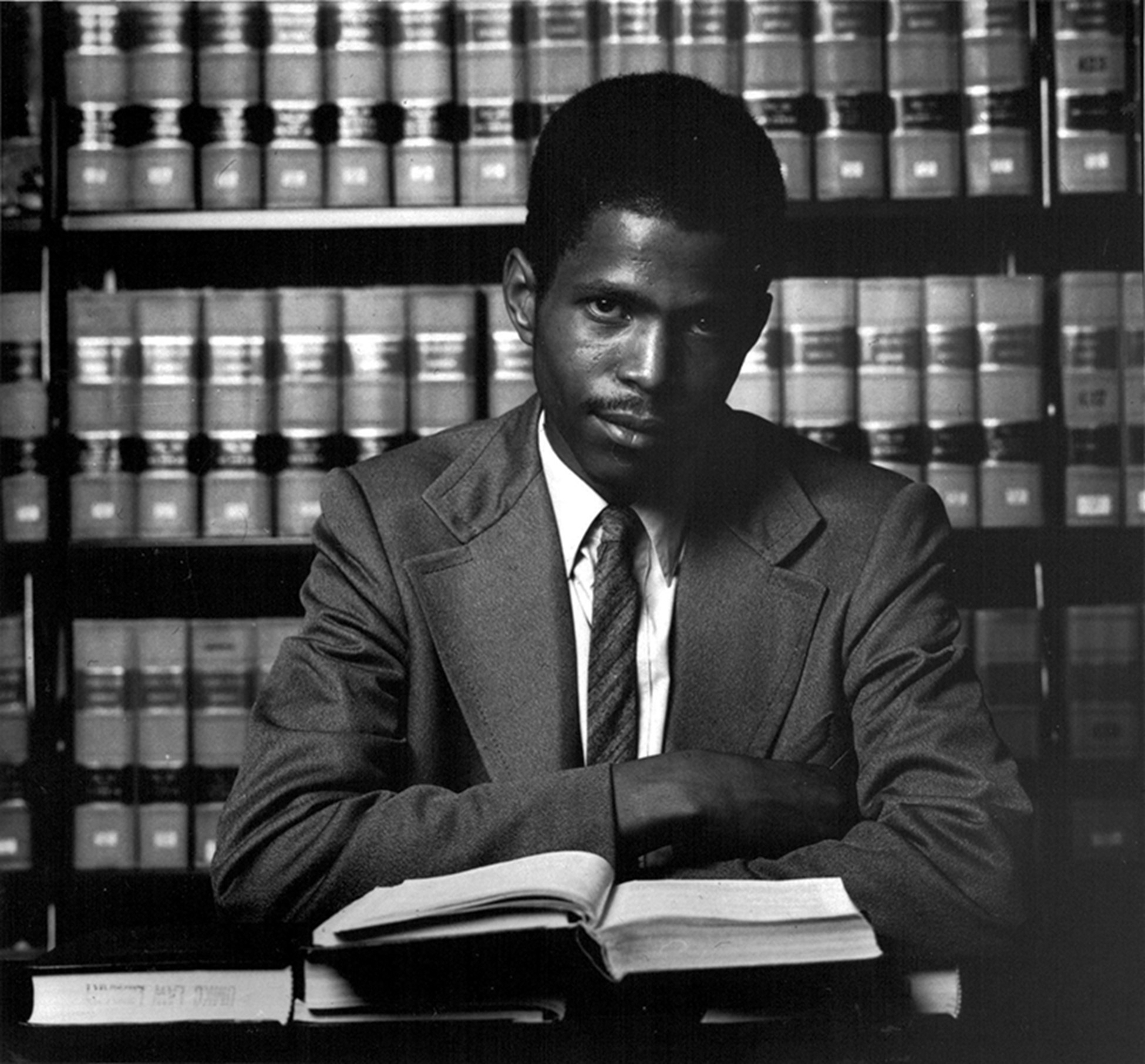Portrait of Alvin Sykes, seated with law book. Courtesy of the Kansas City Star.